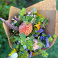 Bouquet with dahlias, greenery, and nasturtium.