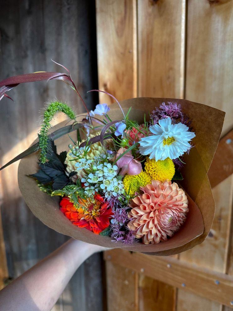 Bouquet with dahlias, cosmos, zinnias, and mums.