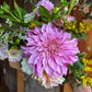 Bouquet with large pink dinnerplate dahlia.